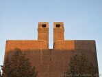 Gevel Cabralstraat, ondergaande zon.
              <br/>
              Gert-Jan Lobbes, 2015